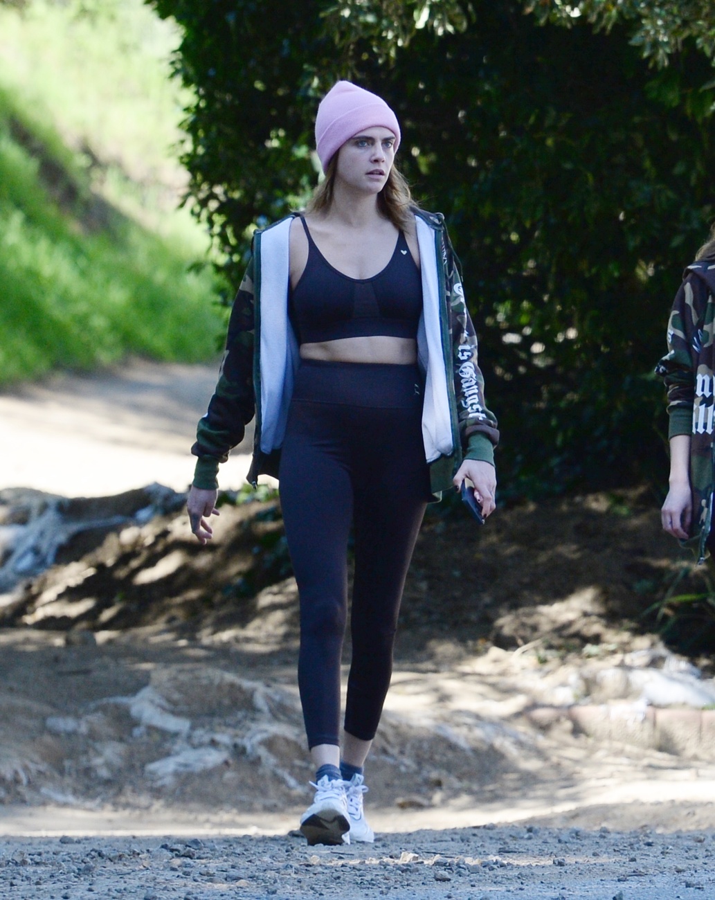 Cara Delevingne strolls through the streets of Los Angeles