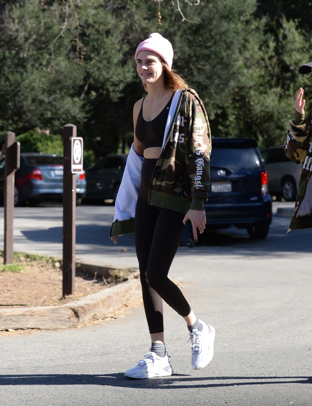 Cara Delevingne strolls through the streets of Los Angeles