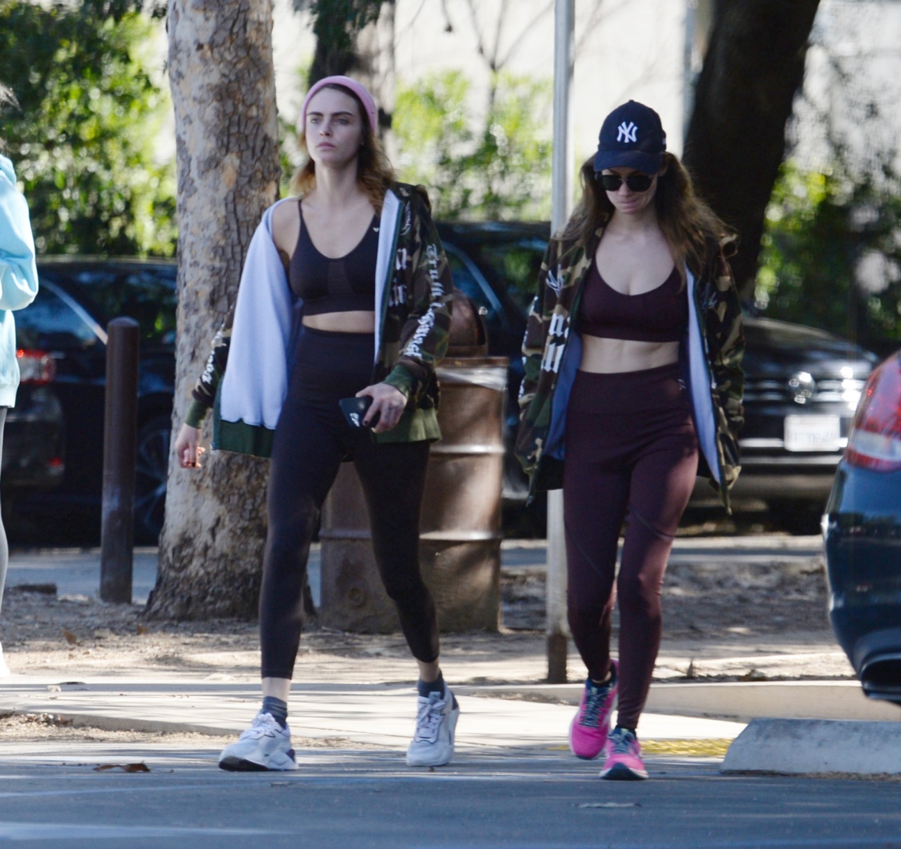 Cara Delevingne strolls smiling and happy with her girlfriend Minke in the streets of Los Angeles