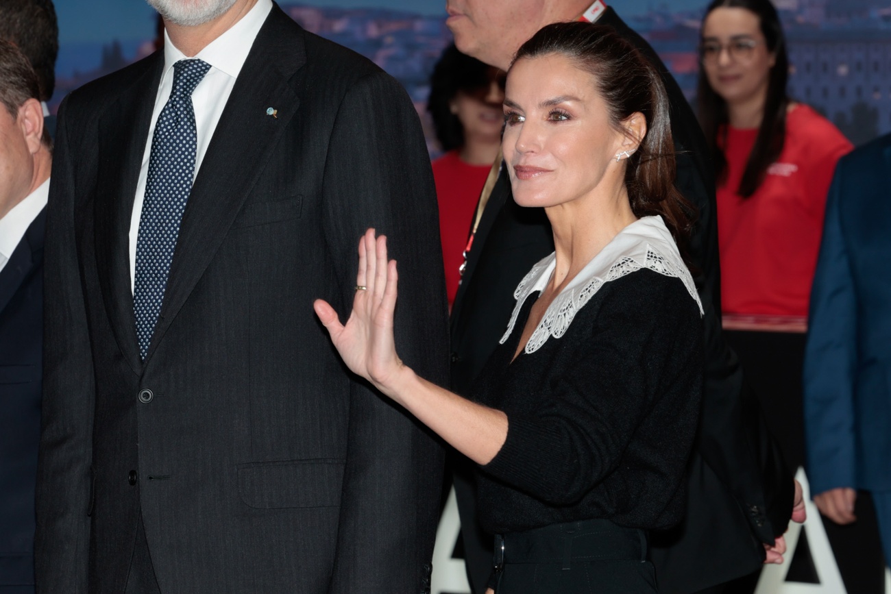Queen Letizia wears a youthful look in black during her visit to the Madrid Tourism Trade Fair